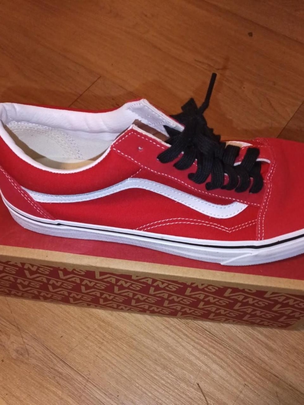 Vans Red Skate Shoe with White Side Stripe and Black Laces